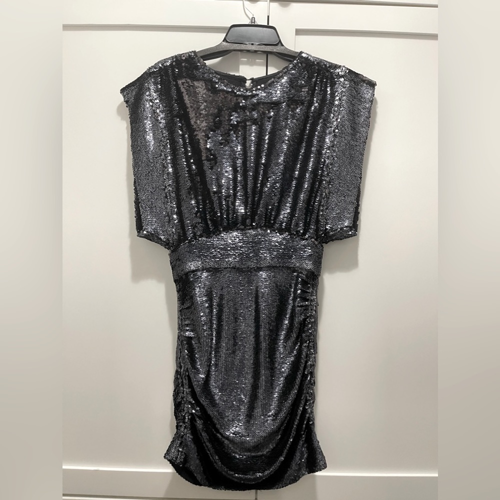 This is a dark grey sequins stunning dress. Never been worn.